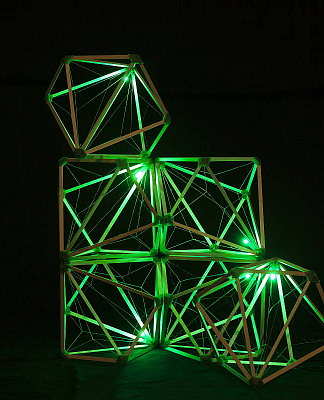 Olafur Eliasson Green light, 2016 Wood (European ash), recycled yogurt cups (PLA), used plastica bags, recycled nylon, LED (green) 35 x 35 cm : Photo Thilo Frank & David de Larrea Remiro / Studio Olafur Eliasson Courtesy of the artist and Thyssen-Bornemisza Art Contemporary; produced on the occasion of Green light: An artistic workshop at TBA21-Augarten, Vienna, by the Green light team © Olafur Eliasson