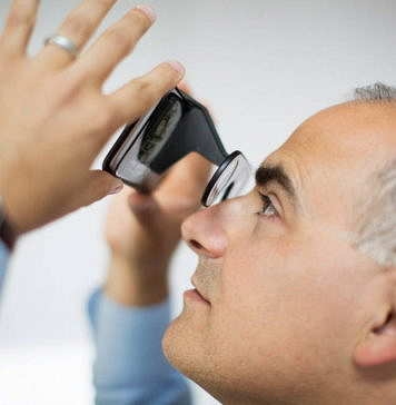 User Looking Up - Project stakeholders can provide immediate feedback to designers via their mobile device : Photo credit © NBBJ