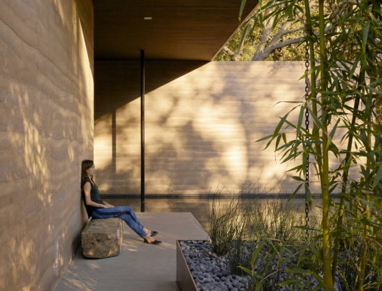 A stone bench salvaged from Stanford’s “bone yard” provides a private spot for reflection : Photo credit © Matthew Millman