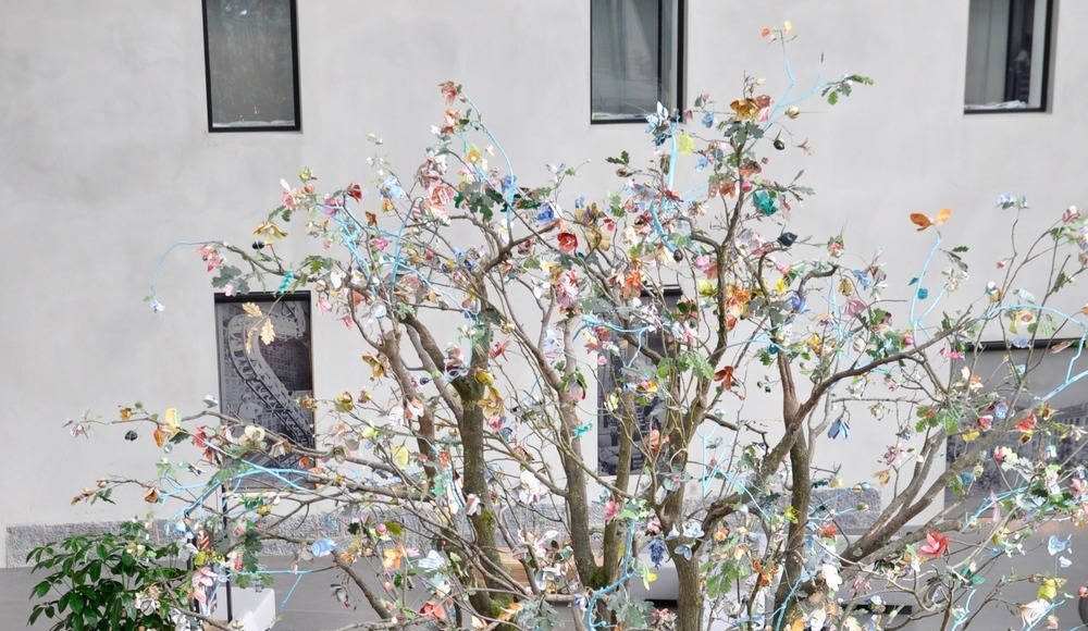 Life-size tree composed of 1200 handmade flowers : Photo credit © Tinker imagineers