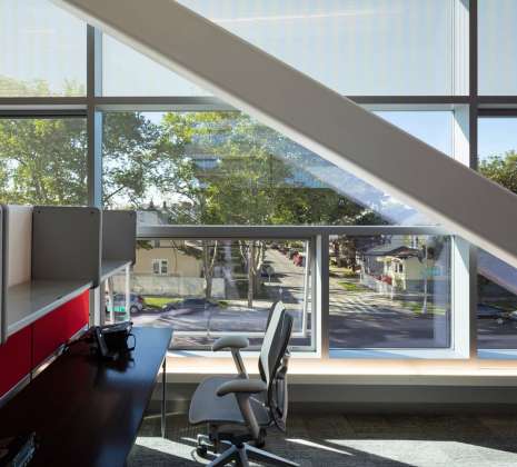 Second story offices look out upon the nearby community of small scale residential buildings : Photo credit © Paul Warchol