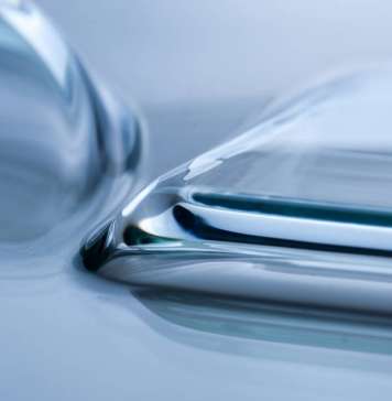 Prototype sheet glass with very small radii, produced using the new laser-based glass forming technology : Photo © Felizitas Gemetz/Fraunhofer IWM