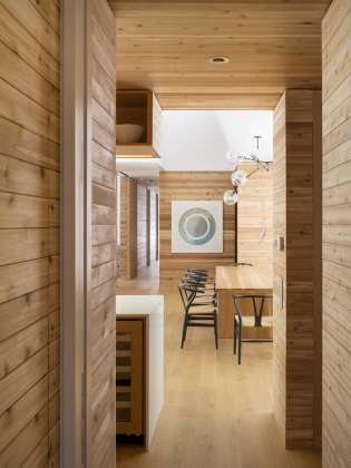 A view from the bedroom suite into the expansive central family space : Photo credit © Ben Rahn / A-Frame Studio