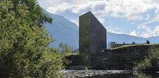 The building is expressed as taking a piece out of the rock and moving it to the opposite side of the river : Photo credit © Steinar Skaar