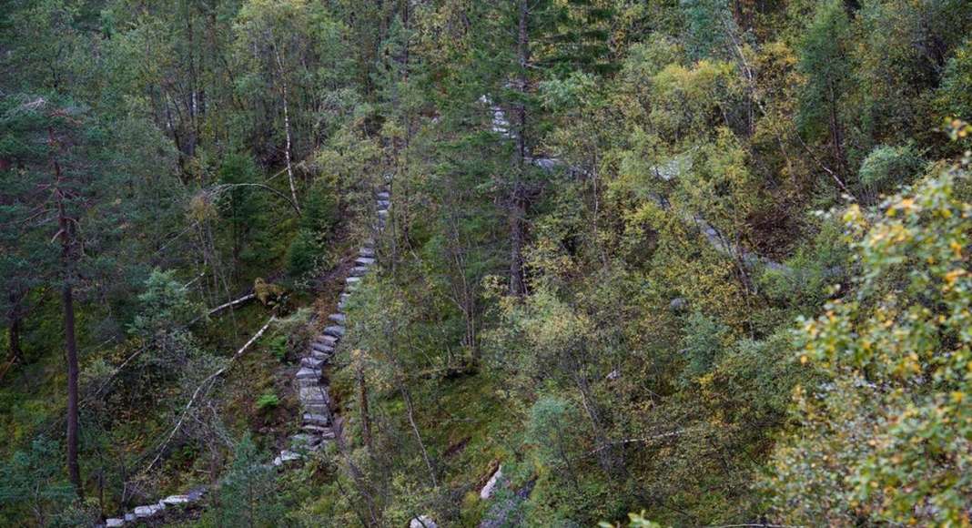 The Stairs: The terrain is steep and was almost impossible to walk in. The new trail, made of natural stone and formed in the terrain, became a central nerve of the project. It connects the different experiences of the waterfall and places of interest, creating a meeting of nature and culture : Photo credit © Pål Hoff