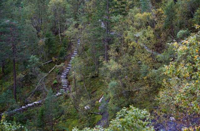 The Stairs: The terrain is steep and was almost impossible to walk in. The new trail, made of natural stone and formed in the terrain, became a central nerve of the project. It connects the different experiences of the waterfall and places of interest, creating a meeting of nature and culture : Photo credit © Pål Hoff