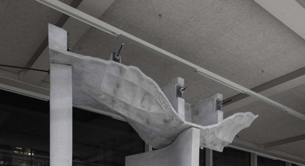 DFAB HOUSE prototype at the Robotic Fabrication Laboratory, ETH Zurich. The prototype demonstrates the seamless combination of other innovation objects on the DFAB HOUSE, such as Smart Dy-namic Casting and the Smart Slab with the Mesh Mould wall : Photo © NCCR Digital Fabrication, 2017