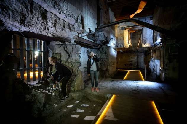 From the sunken galleries, visitors are able to walk into the historic bunker, which grounds the tale of an impressive war machine : Photo credit © Mike Bink Photography