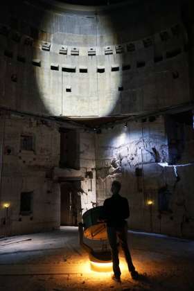 Spotlight in the original Tirpitz bunker : Photo credit © Mike Bink Photography